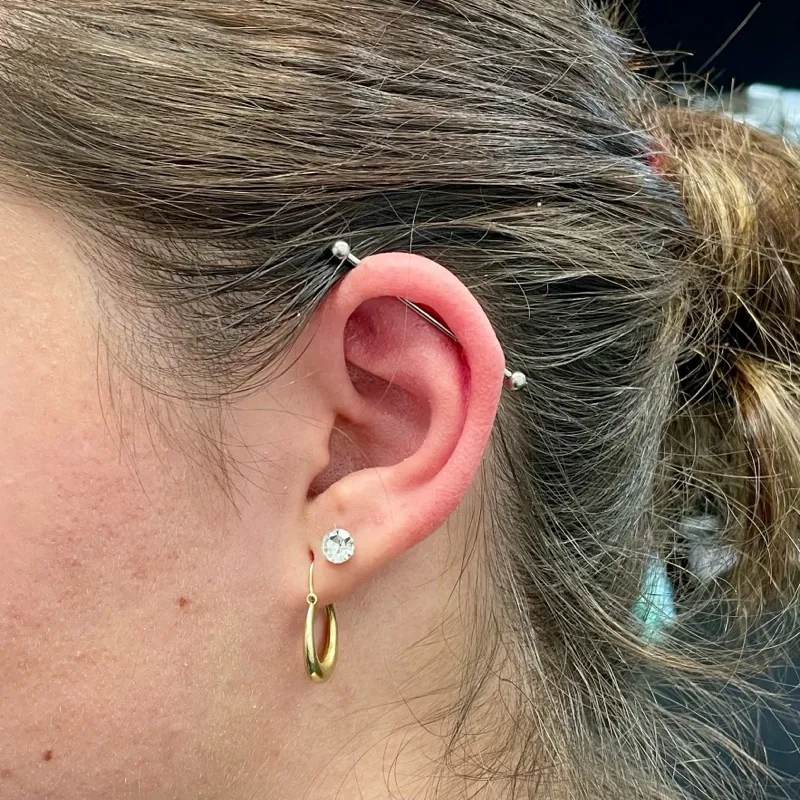 Piercing — spokojená klientka